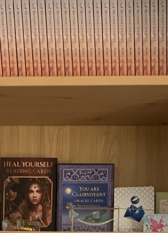 Kerry’s new book ‘A Mothers Jounery’ on a Bookshelf