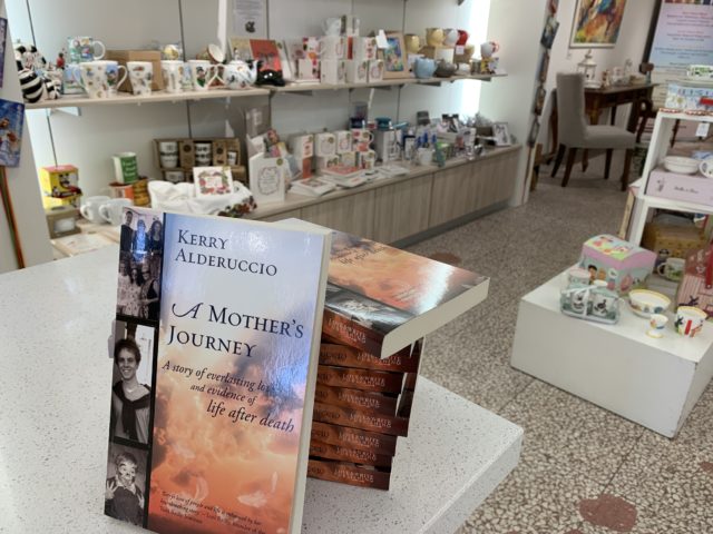 A Mother's Journey by Kerry Aldericcio stacked up at Tea Empress